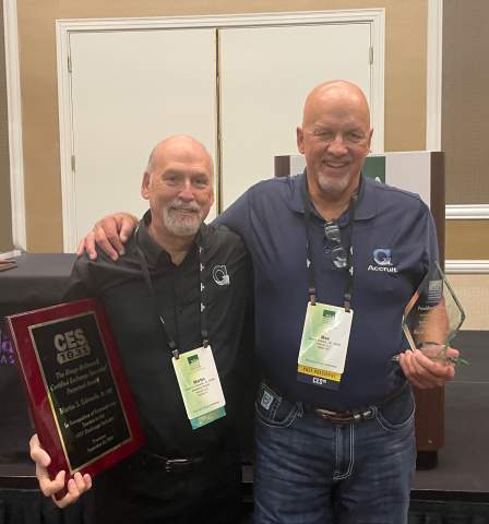 Accruit team members Martin Edwards and Max Hansen receive awards at FEA Annual Conference